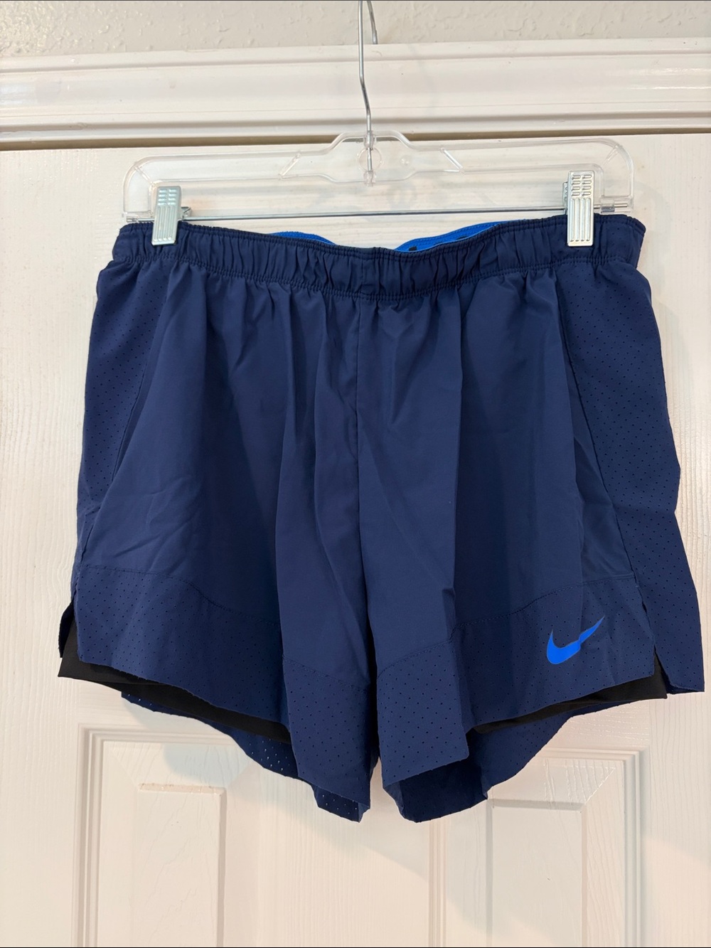 Nike Dri-Fit Navy Blue Athletic Running Shorts with lining to prevent chafing.